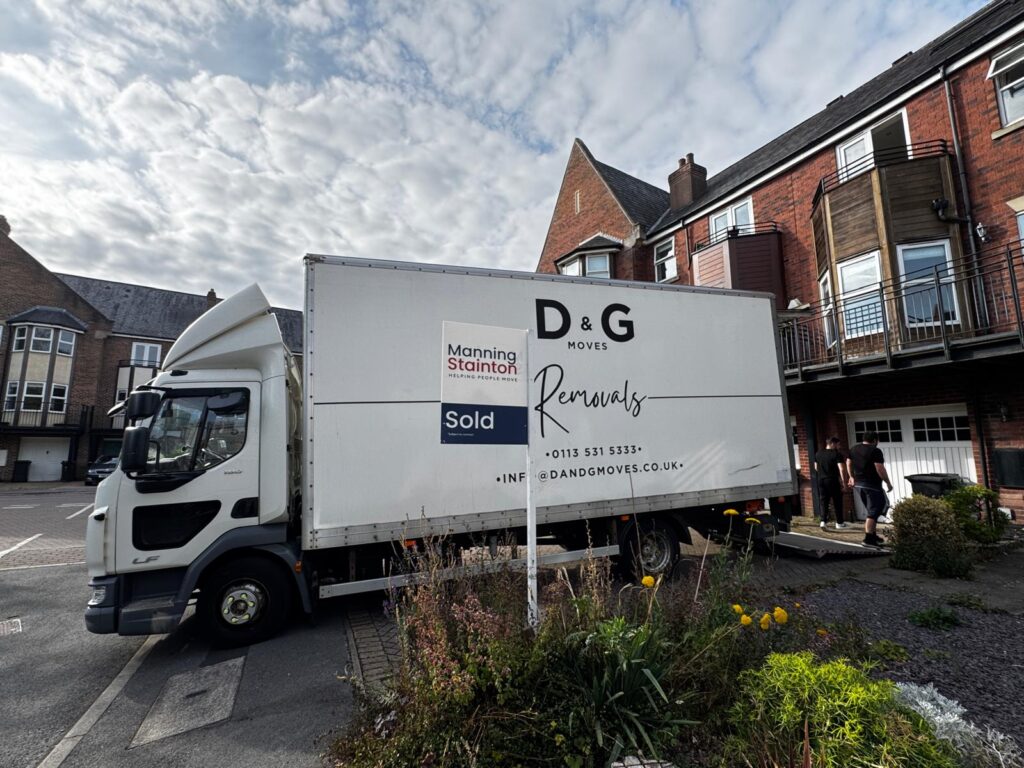removal services trucks on moving day in York