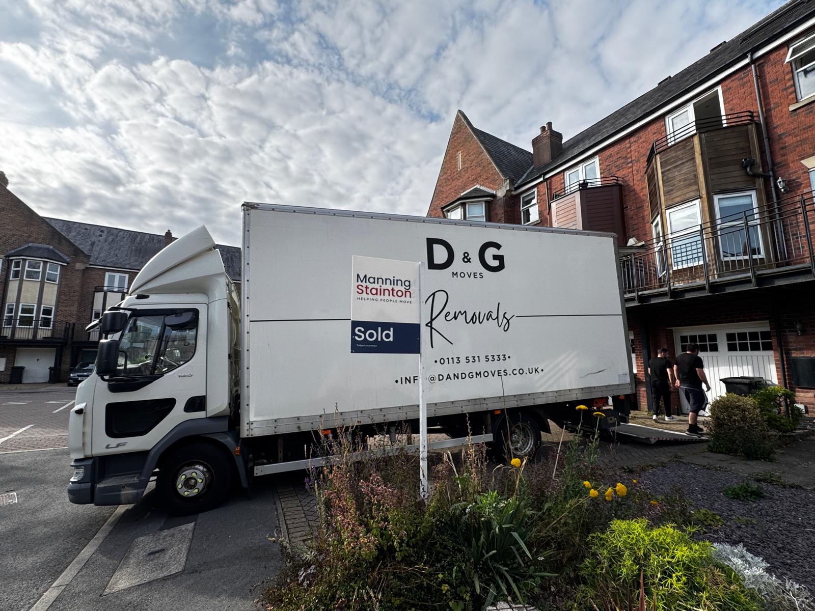 removal services trucks on moving day in York